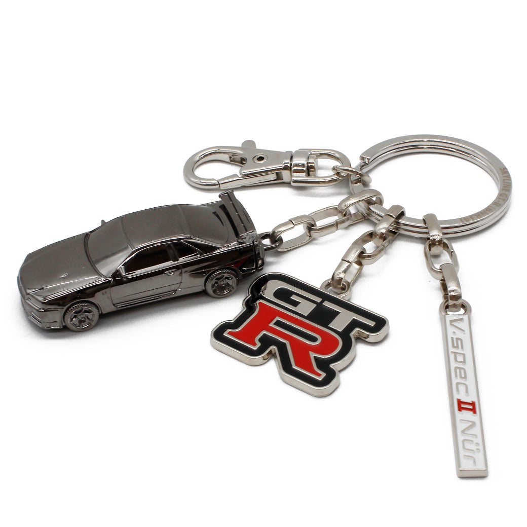 限定5000個、R34「GT-R」立体メタルキーリング フェイスが10月27日発売 限定5000個、R34「GT-R」立体メタルキーリング フェイスが10月27日発売